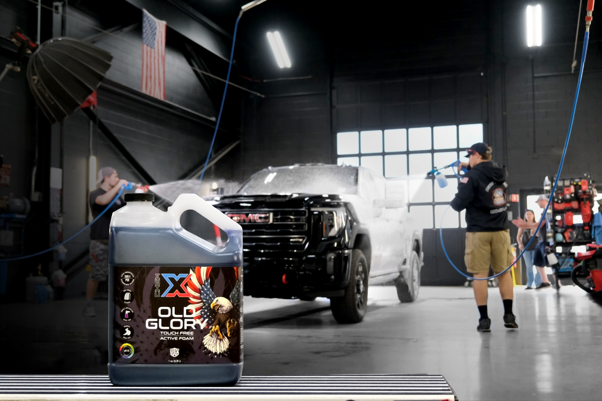 Old Glory Gallon with truck being washed in the background