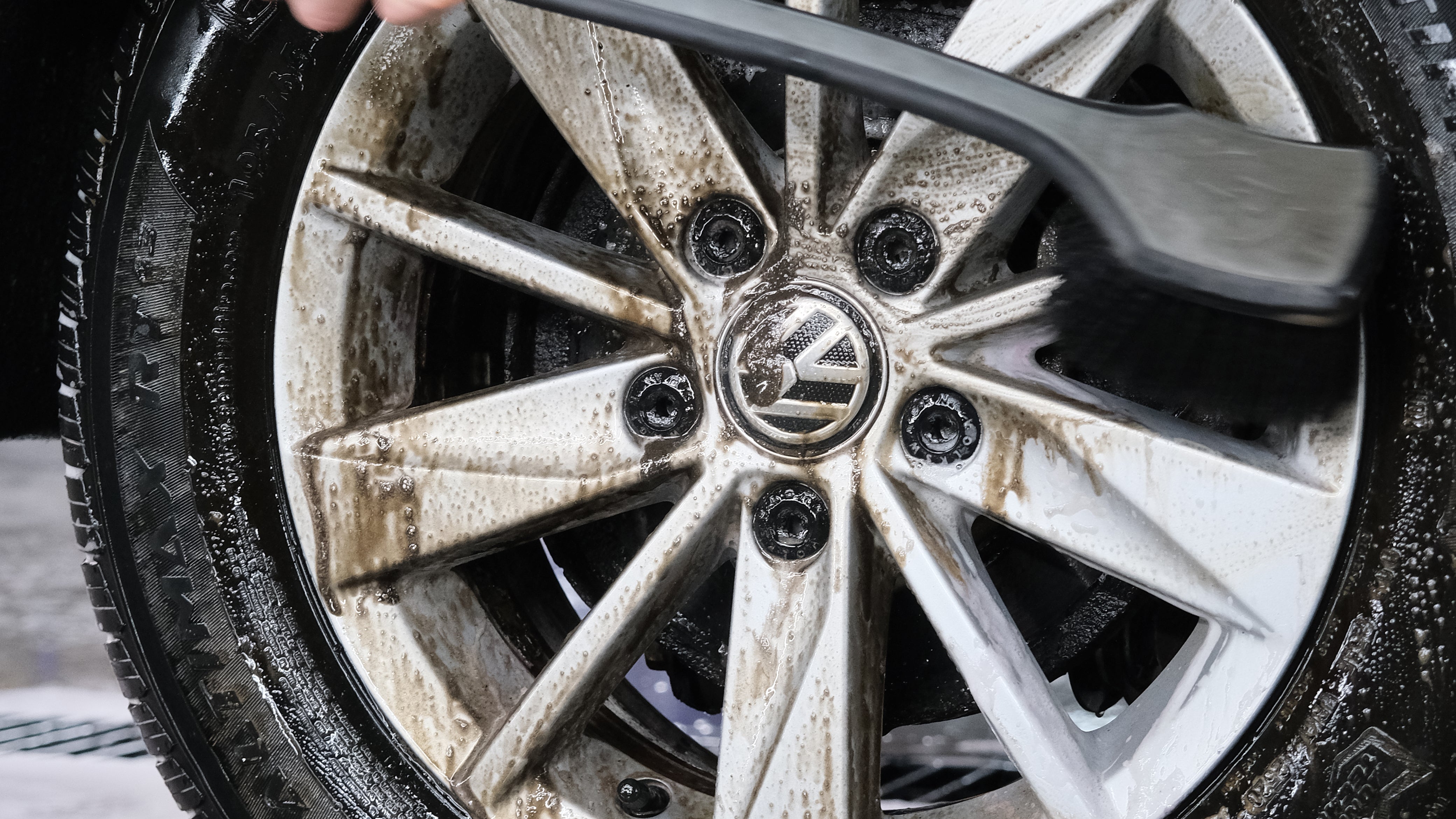 Dirty wheel and fender well brush