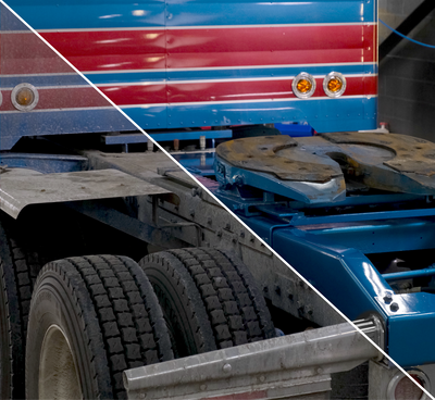 Close-up of a blue and red truck showing the difference between dirty and clean with visible tires and front grille.